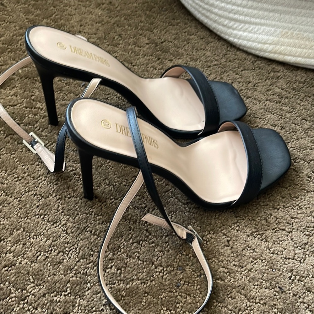 Black high heels. Worn once. Size 10.